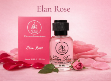 Elan Rose alcohol free perfume by Al Raisi Perfumes with rose petals and pink packaging